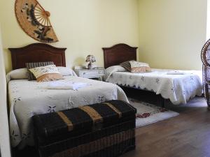 Postel nebo postele na pokoji v ubytování Casa Rural El Capricho del Tejar