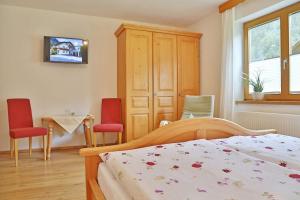 Postel nebo postele na pokoji v ubytování Haus Adlerkanzel