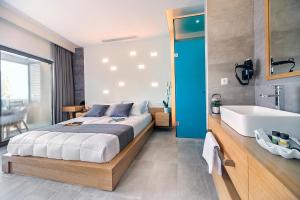 Postel nebo postele na pokoji v ubytování Lilium Luxury Suites