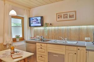 Kuchyň nebo kuchyňský kout v ubytování Haus Adlerkanzel