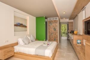 Postel nebo postele na pokoji v ubytování Lilium Luxury Suites