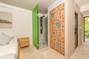 Postel nebo postele na pokoji v ubytování Lilium Luxury Suites