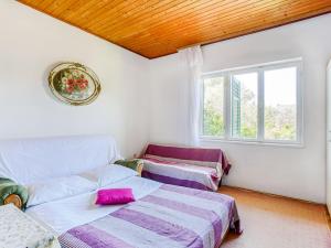 Postel nebo postele na pokoji v ubytování Apartment in Sibenik near Sea Beach