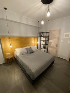 Postel nebo postele na pokoji v ubytování DIIO Suites