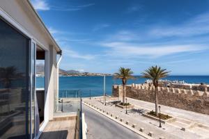 a view of the ocean from a building at Big Blue suites 2 in Ierapetra