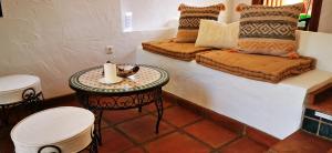Ein Sitzbereich in der Unterkunft Roca Verde, Boutique Bed & Breakfast
