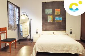 Säng eller sängar i ett rum på Casa Canaria Beautiful Home in Las Canteras