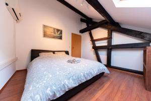 מיטה או מיטות בחדר ב-Burer Millen, Born Mühle