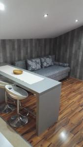 Posezení v ubytování Tena Apartment