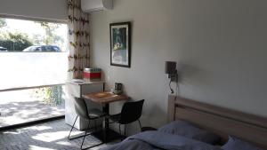 Posezení v ubytování Biesbosch Bed & Breakfast Werkendam