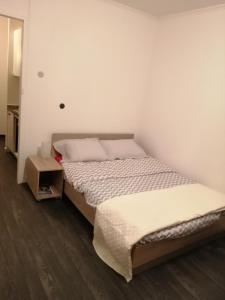 Ένα ή περισσότερα κρεβάτια σε δωμάτιο στο Appartement pres de beauval et des châteaux