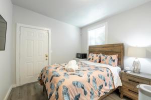 a bedroom with a bed and a window at @ Marbella Lane Mini Guest House in Downtown San Jose in San Jose