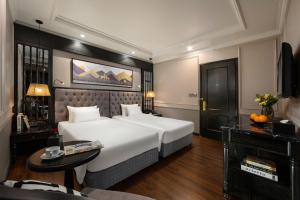Ένα ή περισσότερα κρεβάτια σε δωμάτιο στο Imperial Hotel & Spa