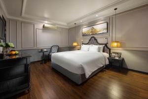Ένα ή περισσότερα κρεβάτια σε δωμάτιο στο Imperial Hotel & Spa