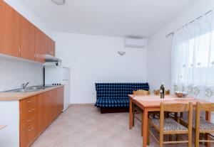 Kuchyňa alebo kuchynka v ubytovaní Apartments Alex