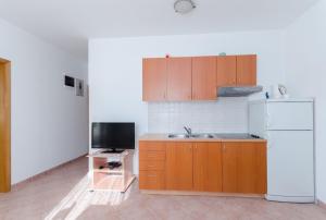 Kuchyňa alebo kuchynka v ubytovaní Apartments Alex