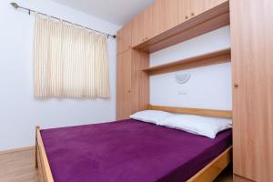 Posteľ alebo postele v izbe v ubytovaní Apartments Alex