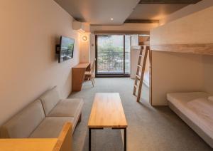 WPÜ HOTEL HAKONE客房内的一张或多张床位