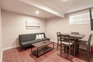 a living room with a couch and a table at @ Marbella Lane 2BR Lower Level House in Downtown San Jose in San Jose