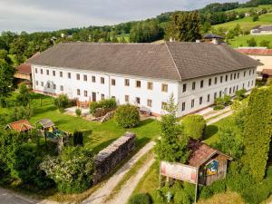 an aerial view of a large white building at Auszeit am Ziegenhof nur für Erwachsene in Schlierbach