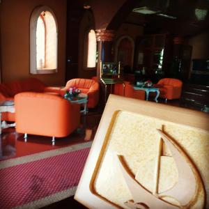 Χώρος καθιστικού στο Bowshar International Hotel