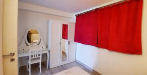 Postel nebo postele na pokoji v ubytování Appartamenti Villa Vagne by Gardadomusmea