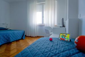 Posteľ alebo postele v izbe v ubytovaní Hotel Mistral