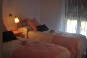 A bed or beds in a room at Casa Chirreas Még 33 kép