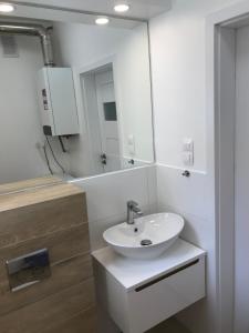 Et badeværelse på Apartament Angelina + 9 billeder