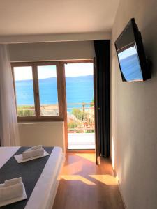 TV a/nebo společenská místnost v ubytování Berulia accommodation
