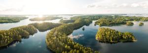 an aerial view of a lake with trees and water at Holiday Resort Harjun Portti in Punkaharju