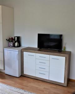 Kuchyň nebo kuchyňský kout v ubytování Ferienwohnung Walgaublick
