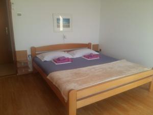 Postel nebo postele na pokoji v ubytování Guesthouse Lisica