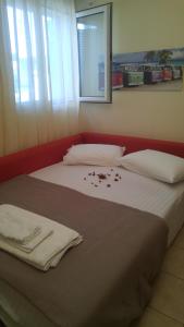 Posteľ alebo postele v izbe v ubytovaní Casa Bella a Skala 2