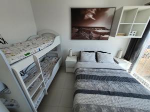 Posteľ alebo postele v izbe v ubytovaní Horyzont