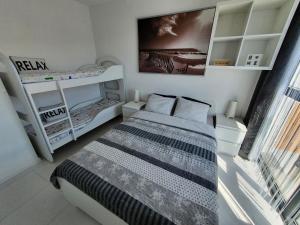 Posteľ alebo postele v izbe v ubytovaní Horyzont