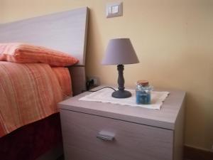 Postel nebo postele na pokoji v ubytování la corta di spello camere