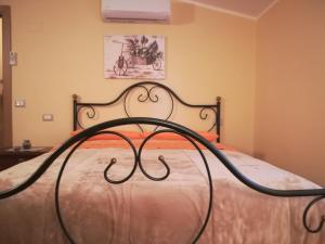 Postel nebo postele na pokoji v ubytování la corta di spello camere