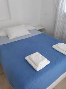 Postel nebo postele na pokoji v ubytování S & K Maisonnettes