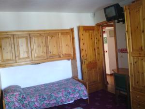Postel nebo postele na pokoji v ubytování Hotel Savoia Debili