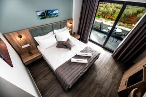 Postel nebo postele na pokoji v ubytování Calda Resort