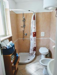 Et badeværelse på Villino Via Sabaudia 39