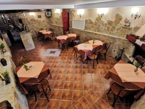 an overhead view of a restaurant with tables and chairs at Dom pod Tujami in Krakow