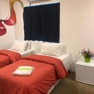 Postel nebo postele na pokoji v ubytování Anhembi Hostel