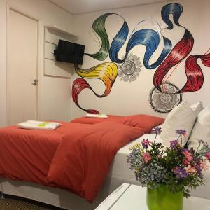 Postel nebo postele na pokoji v ubytování Anhembi Hostel