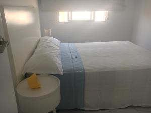 Cama o camas de una habitación en Apartamento primera línea de playa