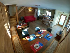 an overhead view of a living room with a table and chairs at B&B Torri di Veglia in San Domenico