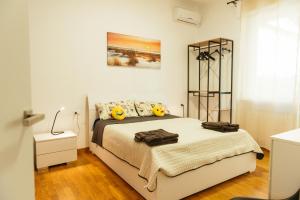 a bedroom with a bed in a room at Luxury Penthouse with Sea View - City Center in Pescara