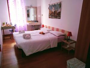Postel nebo postele na pokoji v ubytování Casa Favaretto Guest House