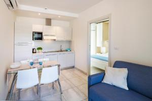 Kuchyň nebo kuchyňský kout v ubytování Mavip Residence